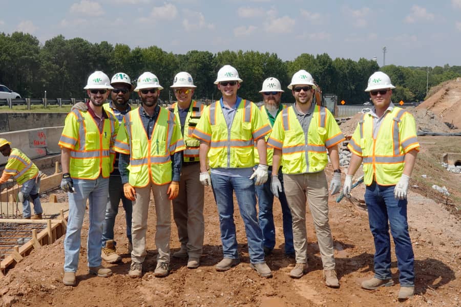 people in PPE on Bluebeam customer Walsh construction job site