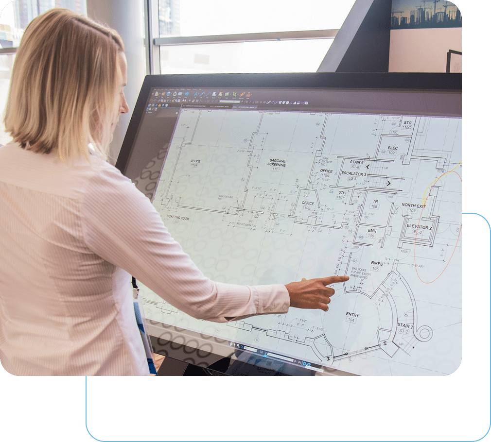 Office professional using Revu on a large touch screen